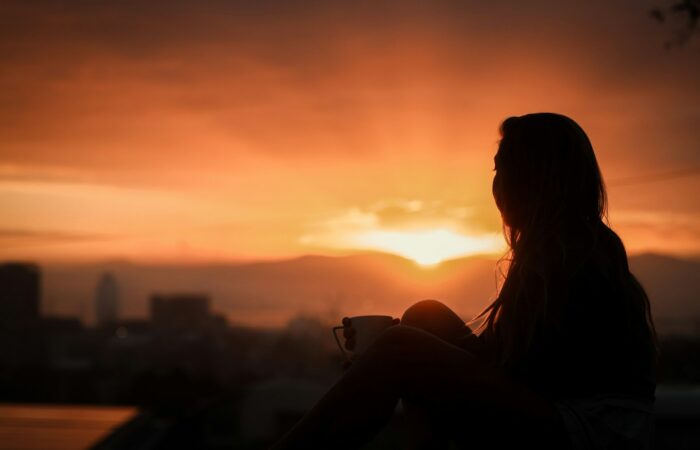 silhouette of woman during sunset